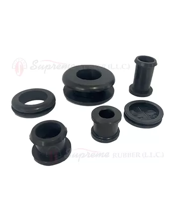 Durable rubber grommet protecting cable in electrical panel
